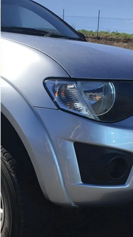 After: scraped bumper and fender restored